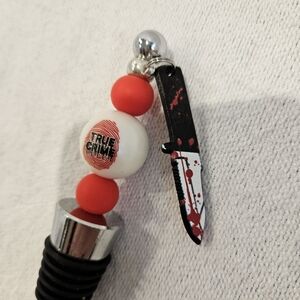 True Crime Red & White Bead Wine Bottle Stopper with Knife Charm